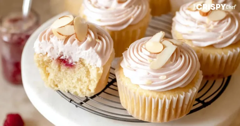 Almond Wedding Cake Cupcakes with Raspberry Filling