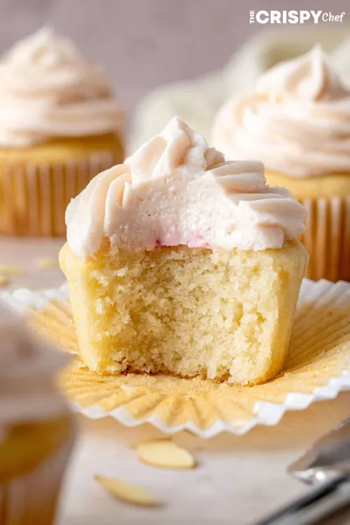 Almond Wedding Cake Cupcakes with Raspberry Filling