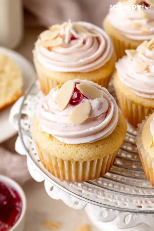 Almond Wedding Cake Cupcakes with Raspberry Filling