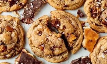 Christmas chocolate chip cookies with colorful sprinkles on a festive plate