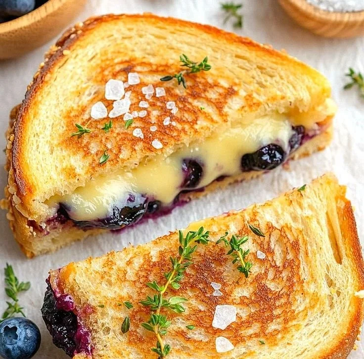 Juicy Blueberry Grilled Cheese sandwich with melted cheese and fresh blueberries