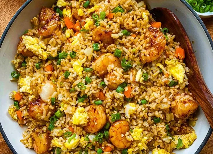 Plate of Bang Bang Fried Rice with colorful vegetables and spices