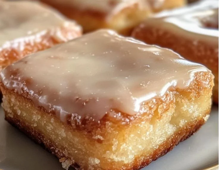 Delicious homemade Maple Donut Bars topped with maple glaze