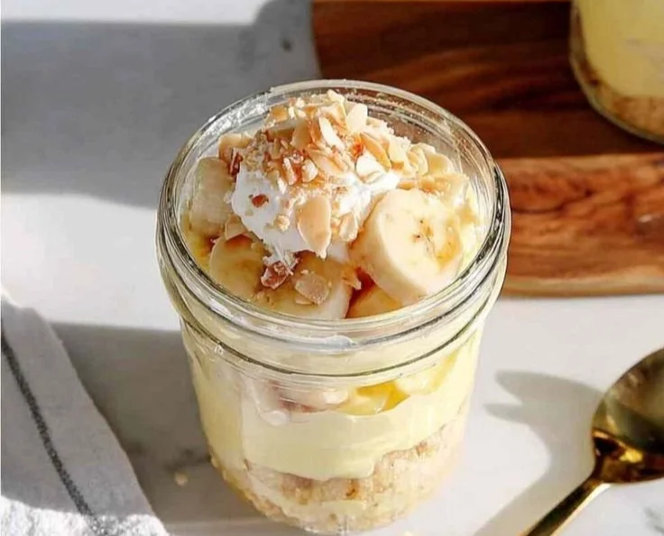 Protein Banana Pudding served in a bowl with banana slices on top