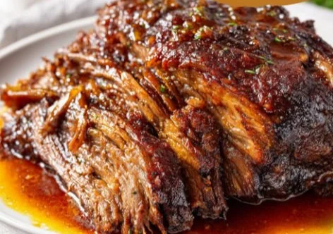 Delicious slow cooked beef brisket served with sides