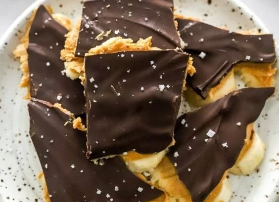 Viral chocolate banana bark topped with banana slices and chocolate drizzles